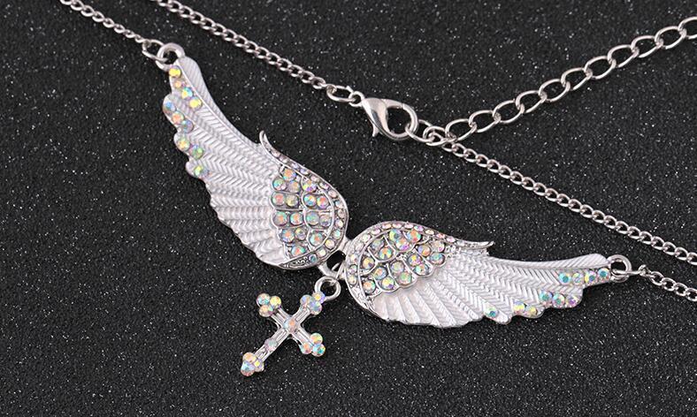 Nouveau - Joli collier avec pendentif ailes d'ange et croix